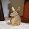 The Round Elk: Hand-Carved Chubby Wooden Figurine – Minimalist Desktop Companion