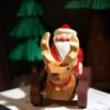 The Joyful Journey: Hand-Carved Wooden Santa on Reindeer Cart – Whimsical Christmas Decor