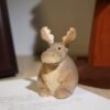The Round Elk: Hand-Carved Chubby Wooden Figurine – Minimalist Desktop Companion