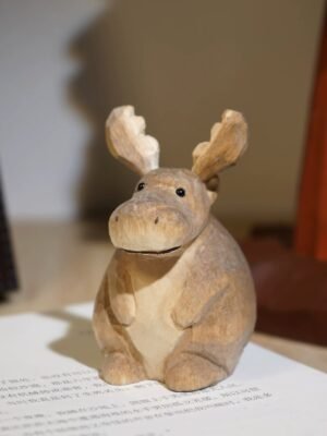 The Round Elk: Hand-Carved Chubby Wooden Figurine – Minimalist Desktop Companion