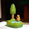Zen at Walden Pond: Hand-Carved Wooden Fishing Cat Sculpture - Miniature Landscape for Soulful Desk Decor
